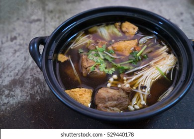 Buk Kut Teh, a Chinese pork soup dish, eat with rice and some vegetable, normally found in Malaysia and Singapore