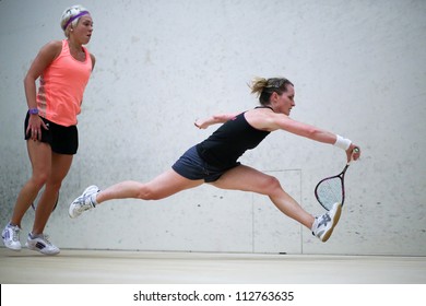 BUKIT JALIL, MALAYSIA - SEPTEMBER 11: Natalie Grinham defeats Lisa Aitken (orange) at the CIMB Malaysian Open Squash Championship 2012 on September 11, 2012 at the National Squash Centre, Malaysia.