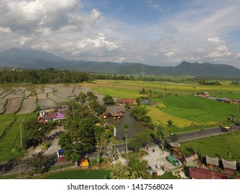 Bukittinggi, Indonesia - June 7, 2019: Images Of Rice Fields In The Countryside Set In The 