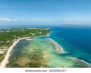 Bulabog Beach with kitesurfing and windsurfing. Ocean waves in Boracay, view from above. Philippines. - Powered by Shutterstock