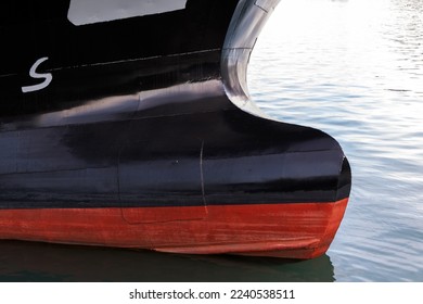 Bulbous bow of an industrial ship. This is a protruding bulb at the bow of a ship reducing drag and thus increasing speed, range, fuel efficiency, and stability