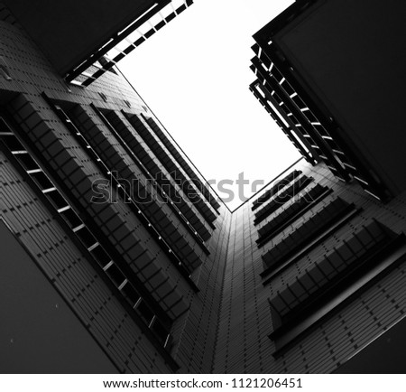 bulding b&w from below with sky