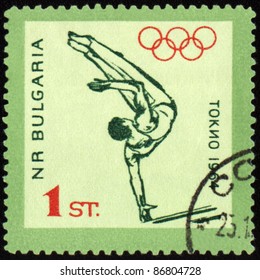 BULGARIA - CIRCA 1964: A Post Stamp Printed In Bulgaria Shows Gymnastics, Devoted To Olympic Games In Tokio, Series, Circa 1964