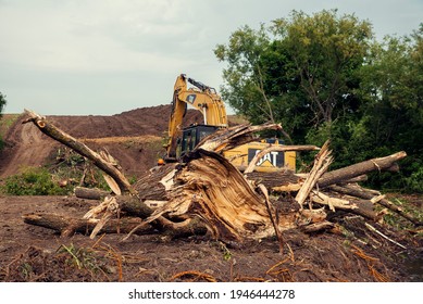 Bulgaria, Ivancha, MAY 20th, 2020: One Yellow Chain Excavators Clearing Vegetation On A Slope During The Construction Of South Stream Pipeline In Bulgaria