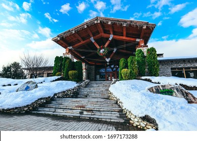 Bulgaria, Pirin Golf Village - April 5, 2020: Country Club, Golf Resort Complex, Main Building Entrance, Luxury Village In Balkan Mountains.