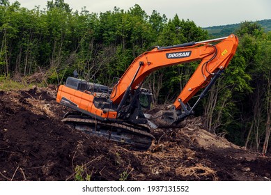 Bulgaria, Polski Trambesh, MAY 20th, 2020: One Chain Excavator Digging The Terrain On A Slope And Clearing Vegetation During The Construction Of South Stream Pipeline In Bulgaria