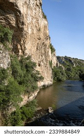 The Bulgarian Balkan Mountains feature steep rock formations along the banks of the Iskar River gorge.