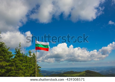 Bulgarian flag with trees and blue sky on background