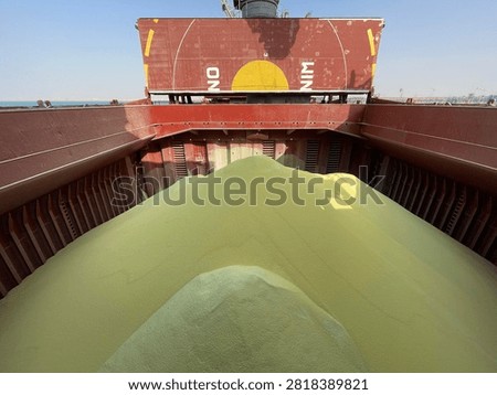 The bulk carrier is engaged in loading sulfur cargo for export through maritime transportation.