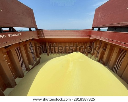 The bulk carrier is engaged in loading sulfur cargo for export through maritime transportation.