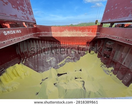 The bulk carrier is engaged in loading sulfur cargo for export through maritime transportation.