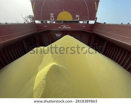The bulk carrier is engaged in loading sulfur cargo for export through maritime transportation.