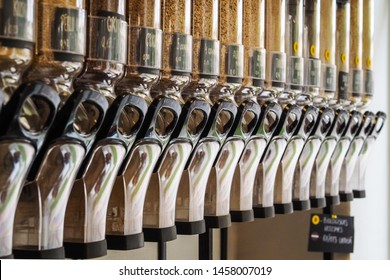 Bulk dry food dispensers at zero waste shop - Powered by Shutterstock