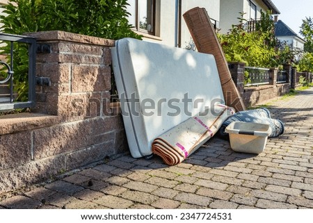 Bulk garbage day concept, miscellaneous rubbish items put on a street for council bulk waste collection, bulky waste and waste management
