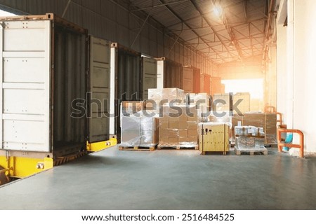 Bulk Pallets of Package Boxes Wrapped Plastic Stacked on Pallets. Trucks Loading at Warehouse Dock. Distribution Warehouse Shipping, Supply Chain Supplies, Shipment. Freight Truck Logistics Transport.