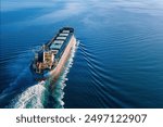 Bulk vessel for dry cargo cruising in sea, ship for unpackaged bulk cargo, aerial view