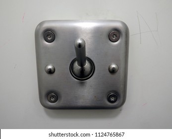 Bulky Steel Industrial Switch Bolted In To The Wall