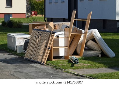 Bulky waste in front of an apartment building in Lindhorst  - Shutterstock ID 2141755807