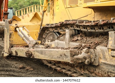 Bull Dozer Tread With Caked Mud And Dirt