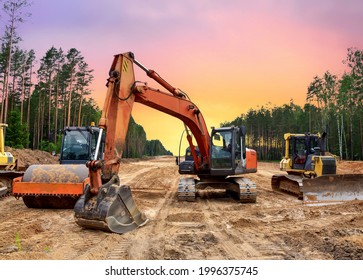 Bulldozer, Excavator And Soil Compactor On Road Work. Earth-moving Heavy Equipment And Construction Machinery  During Land Clearing, Grading, Pool Excavation, Utility Trenching And Digging