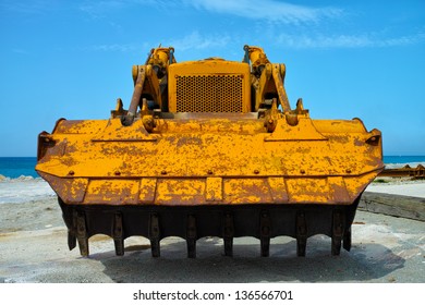 Bulldozer Front View Under Summer Sky