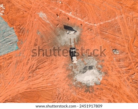 bulldozer on earthmoving at construction site, aerial view background.