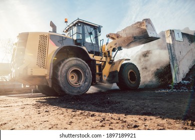 Bulldozer Putting Biomass On Pile For Composting In Industrial Facility