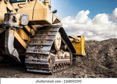 Bulldozer Working On Dirt In The Construction Site