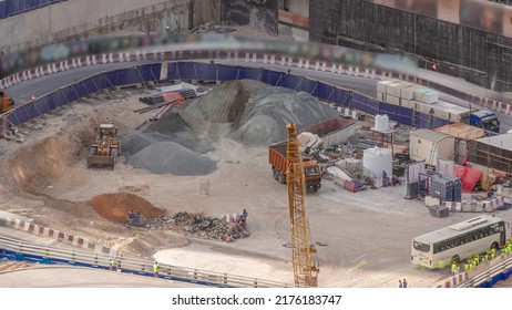 Bulldozers With Cargo Truck Working At Construction Site Of New Skyscraper Aerial. Land Clearing, Grading, Pool Excavation, Utility Trenching And Foundation Digging. Crawler Tractor And Earth-moving