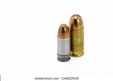 bullet .45 ACP or .45 Auto FMJ (Full Metal Jacket ) closely with 9mm parabellum FMJ isolate on white background