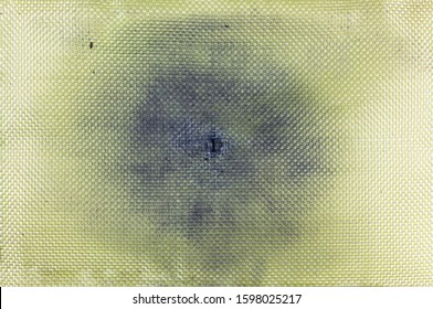 Bullet Damage In The Kevlar Fabric Of The Bulletproof Vest, After Being Fired From A Kalashnikov (AKM-74) From A Distance Of 2 Centimeters (0.22 Yards)