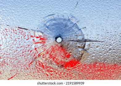 Bullet Hole In Broken Glass And Blood