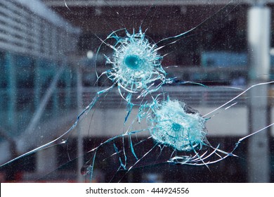 Bullet Hole In Glass.
