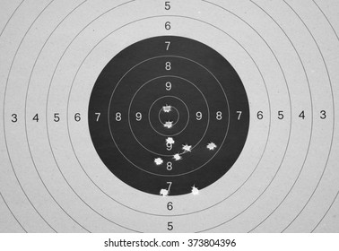 Bullet Hole On Black And White Paper Target