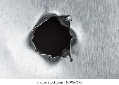 Bullet Hole In Sheet Metal