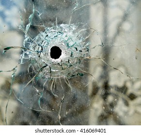 Bullet Hole In A Window