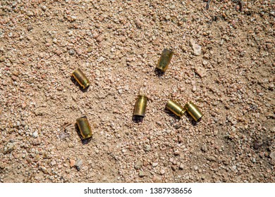 Bullet Shells In The Sand