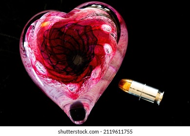 a bullet shot at my red glass heart