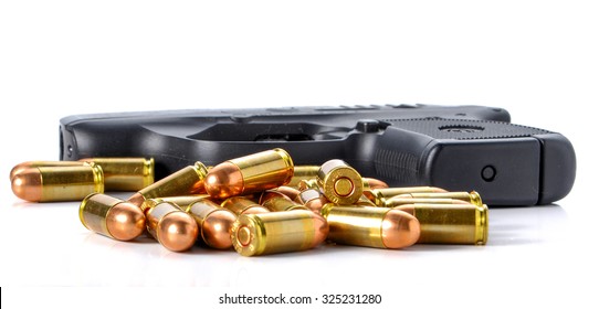 Bullet,gun Placed On White Background.