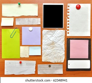 Bulletin Board With Paper Notes And Old Blank