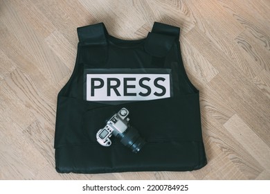 Bulletproof Vest Press And Camera, Photojournalist 