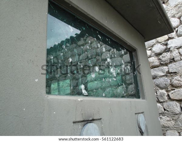 bulletproof\
window of guard house. Shoots were fired on guards. Bullet proof\
window saved guards. Guard was saved by bulletproof window on guard\
house. Bulletproof protection for\
military
