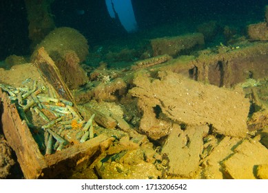 bullets lie around the floor of a sunken ship as they were once its cargo. The vessel that held this cargo was a second world war Japanese ship that was sunk in Chuuk Lagoon during conflict