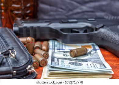 Bullets, Money, Weapons Demonstrating The Concept Of A Bandit. Terrorist Activity.