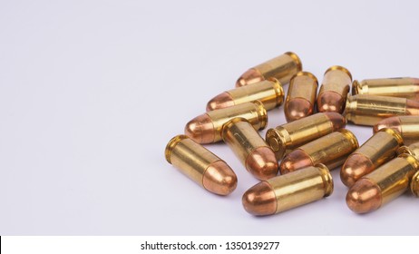 Bullets On A White Background. 45 Acp