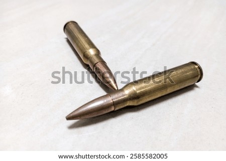 Bullets on white background. Firearm ammunition