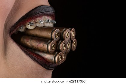 [Image: bullets-revolver-hand-pistol-between-260...117363.jpg]