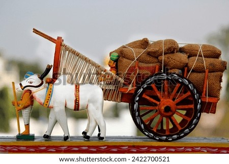 Bullock cart and cow wheat transportation