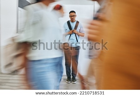 Bullying, depression and sad university student, black man and mental health problems in busy college. Social anxiety, depressed and lonely campus guy, loser and victim fail in school youth education