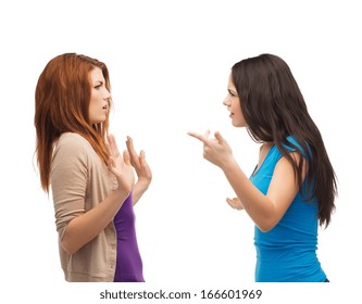 Bullying, Friendship And People Concept - Two Teenagers Having A Fight